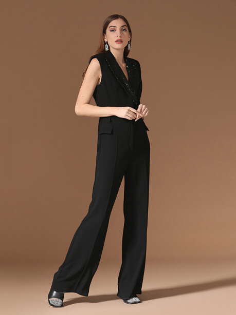 Tuta smanicata con revers in paillettes - 1
