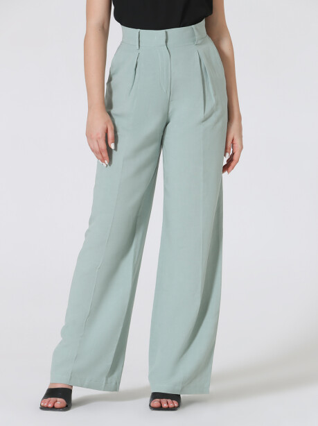 Trousers with pleats in linen - 4