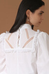 Blusa a collo alto con balze e decorazioni sul retro - 2