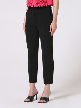 Pantaloni classici con spacchetto sul fondo