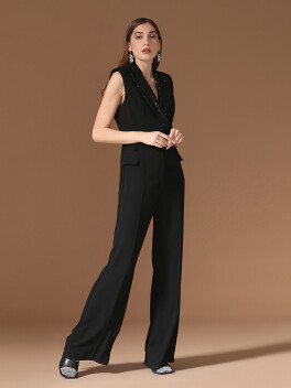 Tuta smanicata con revers in paillettes